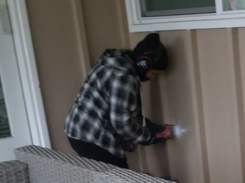 Professional electrician installing an exterior outlet in Colonial Beach